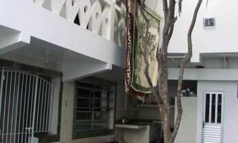 Imagem 1: Sobrado à venda na Praia do Morro, kitnets