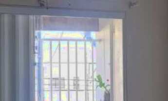 Imagem 6: Casa de dois pavimentos, com 5 quartos, sendo 2 suítes, 2 vagas, na área central do Bairro