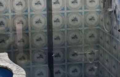 Imagem 6: Casa sem escadas, com 4 quartos (1 suíte), quintal grande e espaço gourmet completo