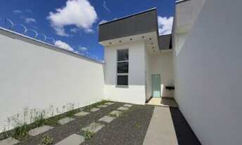 Imagem 2: Casa com 3 quartos (1 suíte), cozinha estilo americana e 2 vagas, excelente acabamento