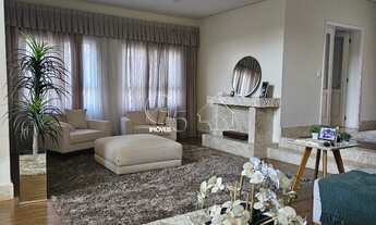 Imagem 2: Casa de luxo em condomínio: 4 quartos, 4 suítes, 4 salas, 6 banheiros, 6 vagas de garagem