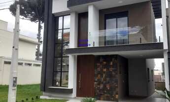 Imagem 2: SOBRADO 207M², 4 QUARTOS UMA SUITE, 4 BANHEIROS, 2 VAGAS, TERRAÇO COM CHURRASQUEIRA, COND