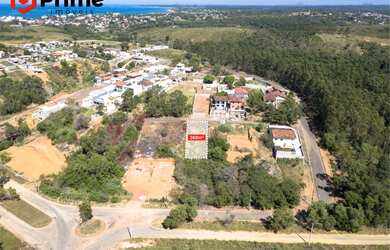 Imagem 2: TERRENO A VENDA EM NOVA GUARAPARI COM 360 M², RUA ASFALTADA, CASA NOVAS DE BOM PADRÃO NA V