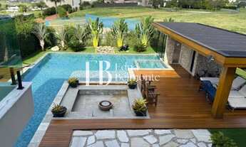 Imagem: LUXUOSA CASA PORTEIRA FECHADA COM 4 SUÍTES