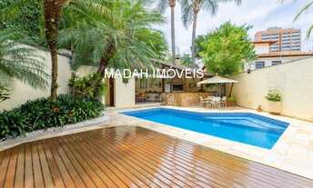 Imagem 4: Bem-vindos a esta incrível casa, onde a beleza, o espaço e a luminosidade são os protagoni