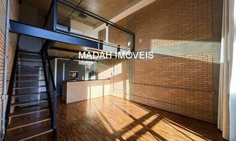 Imagem 2: Enha se encantar com este incrível apartamento duplex localizado no prestigiado CONDOMÍNIO