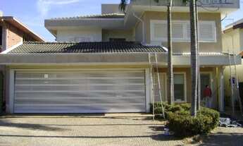 Imagem: 4 dormitórios, 4 suíte, 5 vagas na garagem