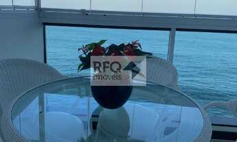 Imagem 7: Aproveite o melhor do Guarujá com esta incrível oportunidade! Um apartamento reformado e d