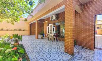 Imagem 1: Casa a venda com 3 dormitorios, 3 vagas de garagem e edicula totalizando 4 dormitórios, se