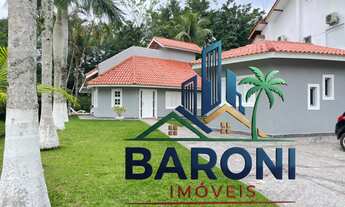 Imagem 2: Casa para locação na Riviera de Bertioga-SP: 3 quartos, 2 suítes, 2 salas, 3 banheiros, 6