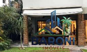 Imagem 2: Casa de Luxo à Venda na Riviera em Bertioga-SP: 5 Quartos, 2 Suítes, 3 Salas, 5 Banheiros