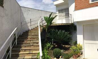 Imagem: 3 dormitórios, 5 banheiro, 4 vagas na garagem