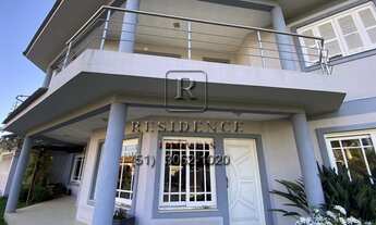 Imagem 5: Imóvel de Luxo: Casa com 3 quartos, 3 suítes e 259,85m² à venda em Canoas-RS, bairro Marec