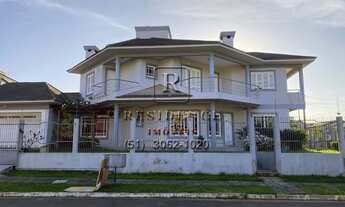 Imagem 2: Imóvel de Luxo: Casa com 3 quartos, 3 suítes e 259,85m² à venda em Canoas-RS, bairro Marec