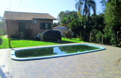 Imagem 7: SITIO NO MUNICIPIO DE TAQUARA COM 1 HECTAR E COM 3 RESIDENCIAS PISCINA HORTA GALPÃO E ARRO