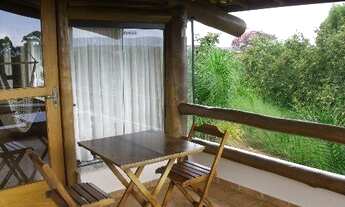 Imagem 7: Casa em condomínio AT: 6.900,00 e AC: 580,00m2, em estilo rústico. Com 03 dormitórios, sen