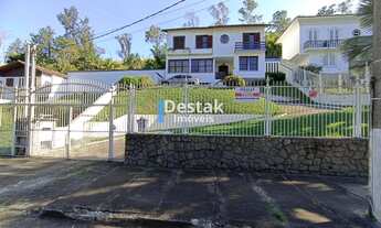 Imagem: 4 dormitórios, 1 suítes, 2 vagas na garagem