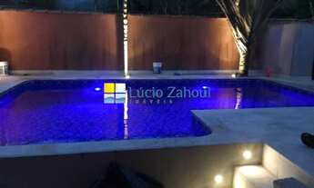 Imagem 2: Casa em condomínio à venda em Camburi com 3 suítes