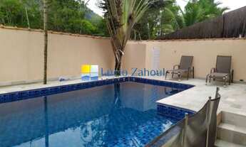 Imagem 3: Casa em condomínio à venda em Camburi com 3 suítes