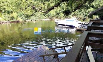 Imagem: Casa fora de condomínio frente ao rio à