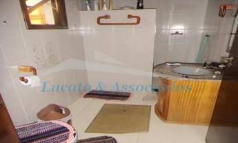 Imagem 3: Casa isolada na Mirim Praia Grande SP, sendo 04 dormitorios, 01 suite, 03 banheiros, 01 sa