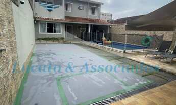 Imagem 6: Casa isolada no Jardim Real Praia Grande SP, sendo 03 dormitorios, 01 sala, 01 cozinha, 03