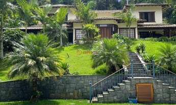 Imagem: Casa com 4 suítes, 427 m² no Comary