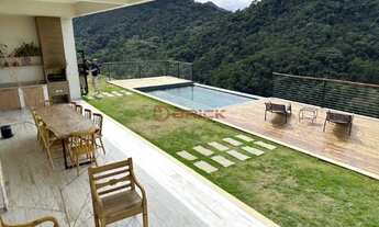 Imagem: Casa com 4 suítes em condomínio em Vargem