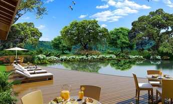 Imagem: Terreno em declive com 341 m² em condomínio