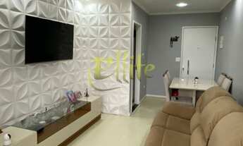 Imagem 2: 2 quartos, sendo 1 suíte, 1 banheiro, 1 vaga de garagem e uma área total de 54,00 m2