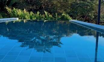 Imagem 4: Casa à Venda em Alphaville 2 ? 4 Suítes, 496m², Piscina e Energia Solar