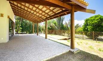 Imagem 6: Com um conceito moderno essa bela casa com cinco suítes a venda em Praia do Forte - Salvad