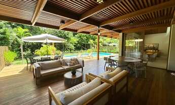 Imagem 7: Com ambientes amplos e moderno essa casa decorada com quatro suítes e área gourmet a venda