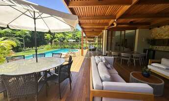 Imagem 6: Com ambientes amplos e moderno essa casa decorada com quatro suítes e área gourmet a venda