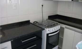 Imagem 3: Apto sendo 1 suite com armários, sala ampla com linda vista, cozinha americana com armário