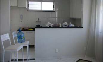 Imagem 6: Apto sendo 1 suite com armários, sala ampla com linda vista, cozinha americana com armário