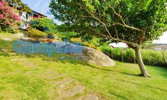 Imagem 6: ALUGO EM GAROPABA, sobrado beira mar, bairro nobre, Vigia, com 4 dormitórios, 3 casal (1