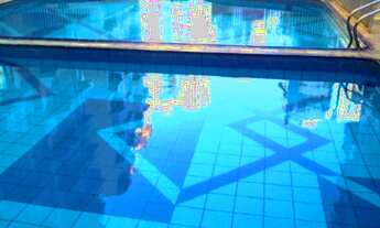 Imagem: Apto central em predio com piscina