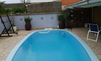 Imagem: CASA COM PISCINA NA PRAIA DOS AMORES BALNEÁRIO