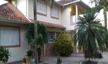 Imagem 1: Imóvel excepcional à venda em Porto Alegre: Casa de 4 quartos, 2 salas, 3 banheiros, 6 vag