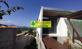 Imagem 2: Casa à venda em Caraguatatuba-SP: 3 quartos, suíte, sala com vista para o mar e deck com h