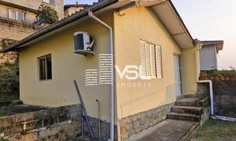 Imagem 2: Propriedade com duas casas, casa principal com 4 dormitórios e terreno de 400 m²