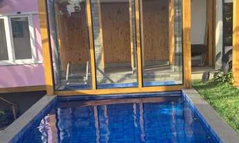 Imagem 1: Casa em Condomínio de Luxo no Jardim Mantova: 3 Suítes, 2 Salas, 4 Banheiros e Vagas de Ga