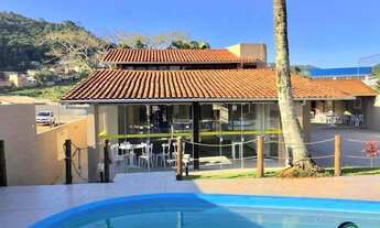 Imagem: 2 dormitórios, 4 banheiro, 3 vagas na garagem