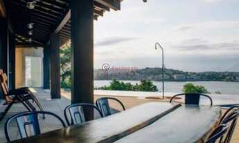 Imagem 2: Casa excepcional de 4 suítes com vista panorâmica ao mar no Morro do Moreno!