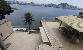 Imagem 1: Casa de Luxo com 3 Suítes e 4 Vagas no Parque Prainha, São Vicente-SP: Imperdível Oportuni