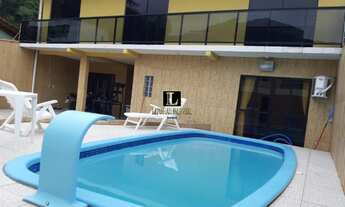 Imagem: 4 dormitórios, 3 suíte, 2 vagas na garagem