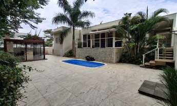 Imagem: 4 dormitórios, 3 suíte, 6 vagas na garagem