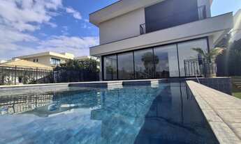 Imagem: 4 dormitórios, 4 suíte, 6 vagas na garagem