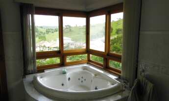 Imagem: 3 dormitórios, 3 suíte, 5 banheiro, 4